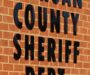 Police find cache of guns and ammo executing search warrant, charge local man